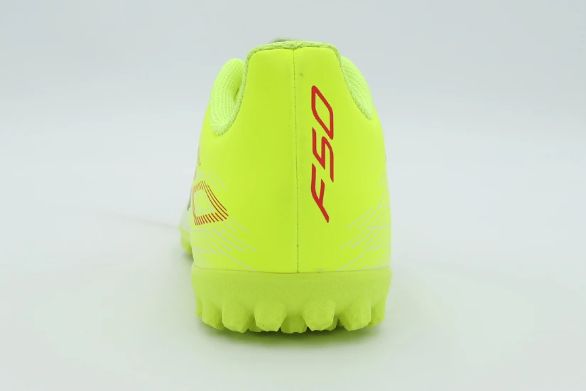 Adidas Performance F50 Club Turf Παιδικά Ποδοσφαιρικά Παπούτσια με Σχάρα Κίτρινο Φλούο, Λευκά, Μαύρα